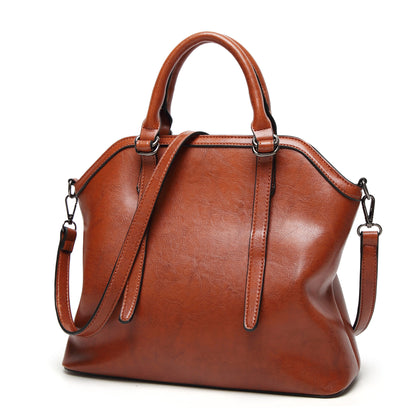 Pure and Simple, Lady Leather Grip Handbags in Rich Tones