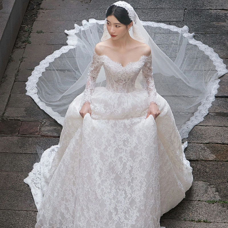 Maiden Faire, Off-shoulder Long Sleeve Trailing Lace Wedding Dress